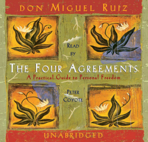 Book cover of “The Four Agreements” – a short spiritual guide based on ancient Toltec wisdom.